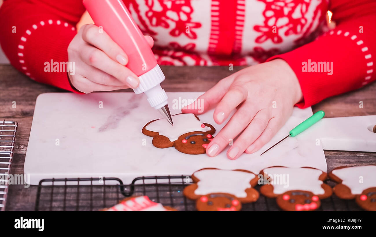 Step by step. Decorating gingerbread cookies with royal icing Stock