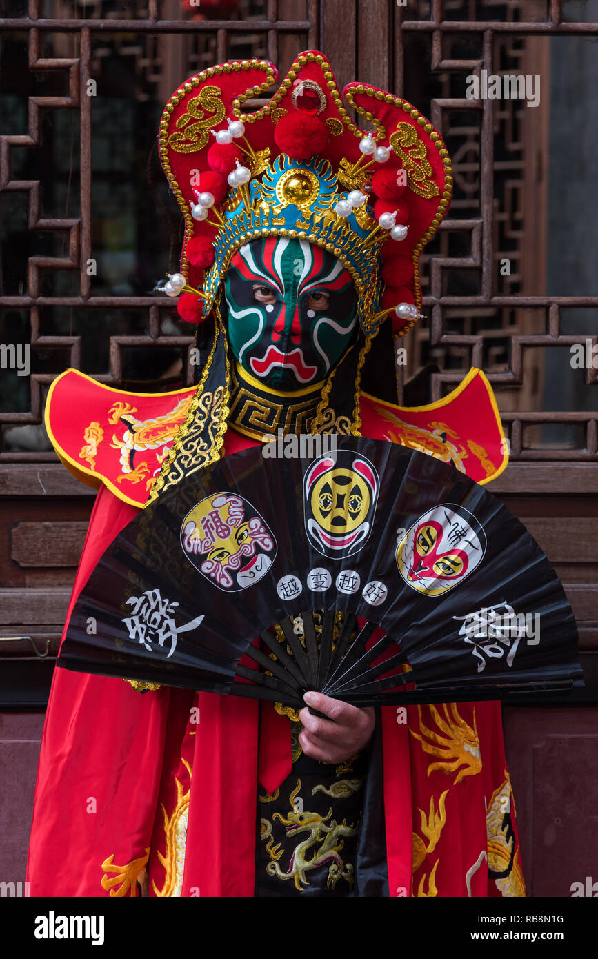 Chengdu, Sichuan Province, China - Nov 18, 2018 : Portrait of a yound man dressed in Sichuan Opera traditional costume in Jinli street touristic area. Stock Photo