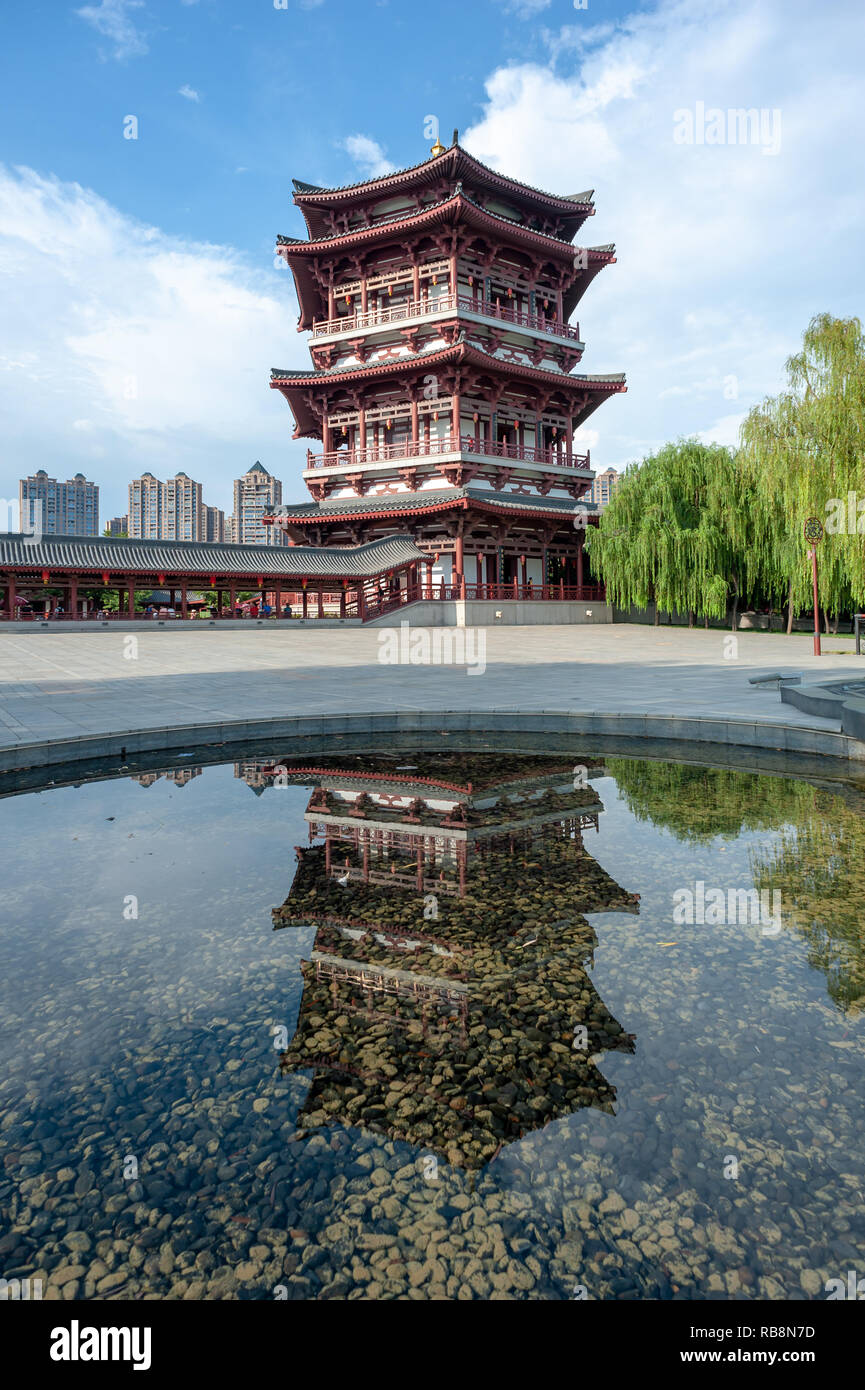 Xi'an, Shaanxi province, China - Aug 12, 2018 : Pagoda and reflection in water in Tang paradise park Stock Photo