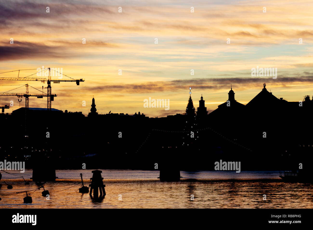 Silhouette of Stockholm skyline mid winter at sunset Stock Photo - Alamy