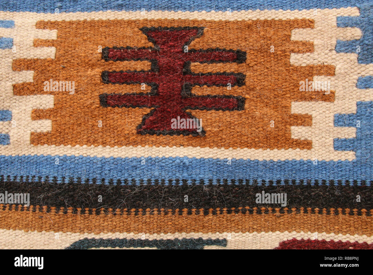 Old traditional Jordan carpet with a geometric pattern blue, white and