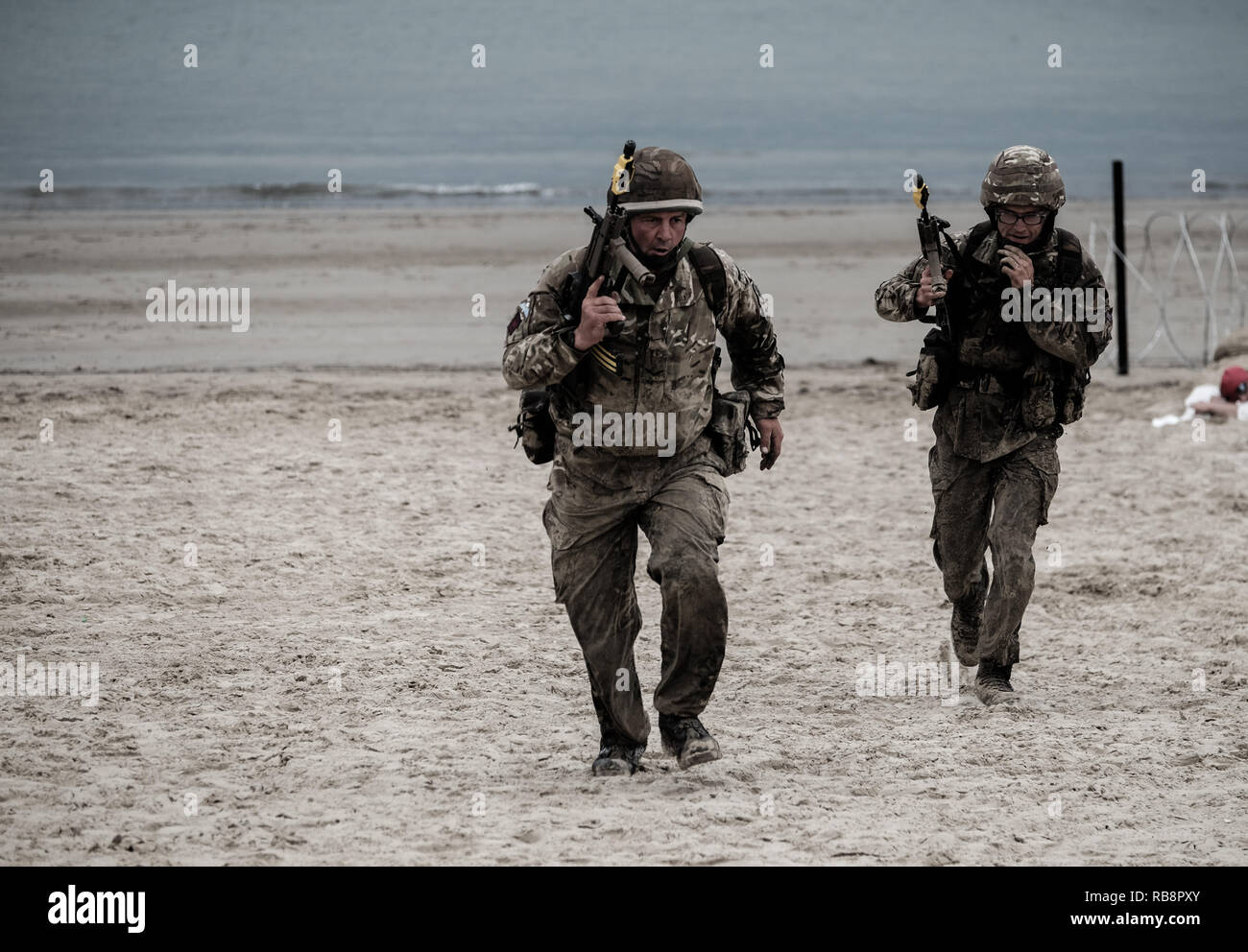 Soldiers, simulating a beach landing as part of Armed Forces Day in ...