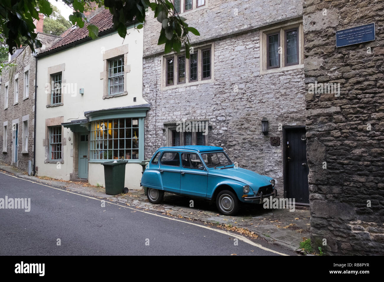 Blue Citroen Diane car in front of old house in Frome Stock Photo