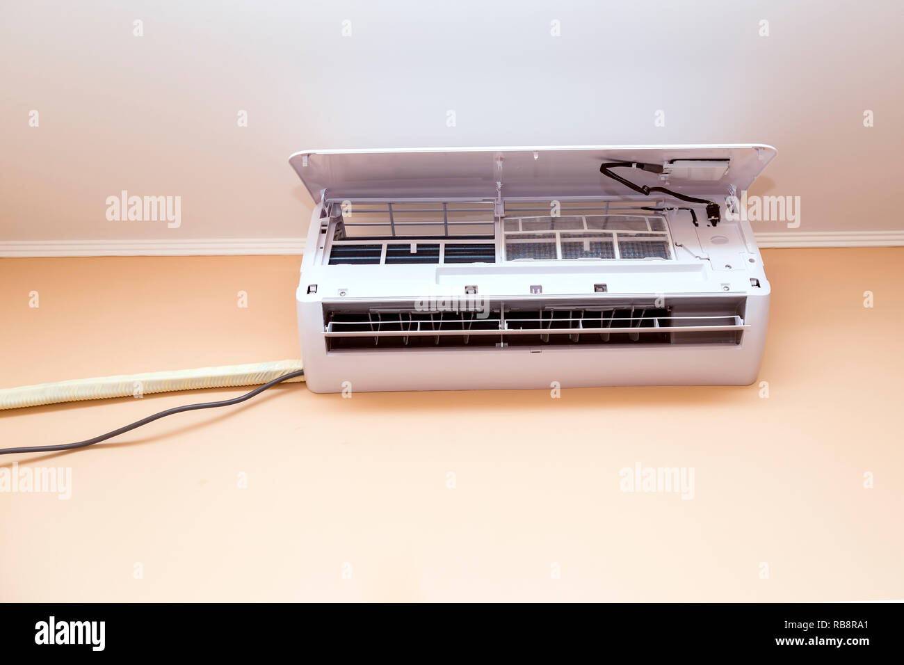 Wall-mounted air conditioner for cleaning Stock Photo