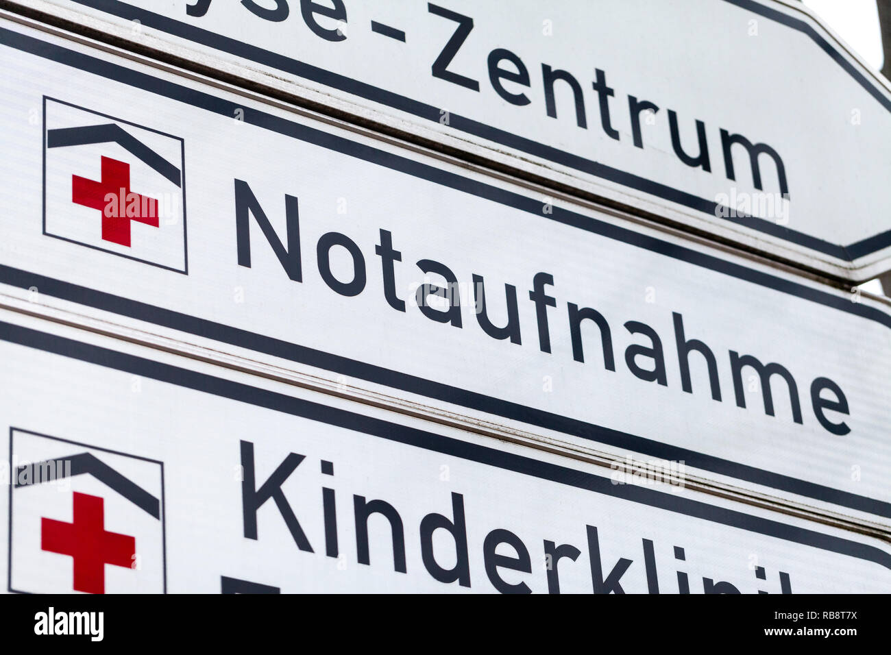 German accident and emergency department sign stands on a street