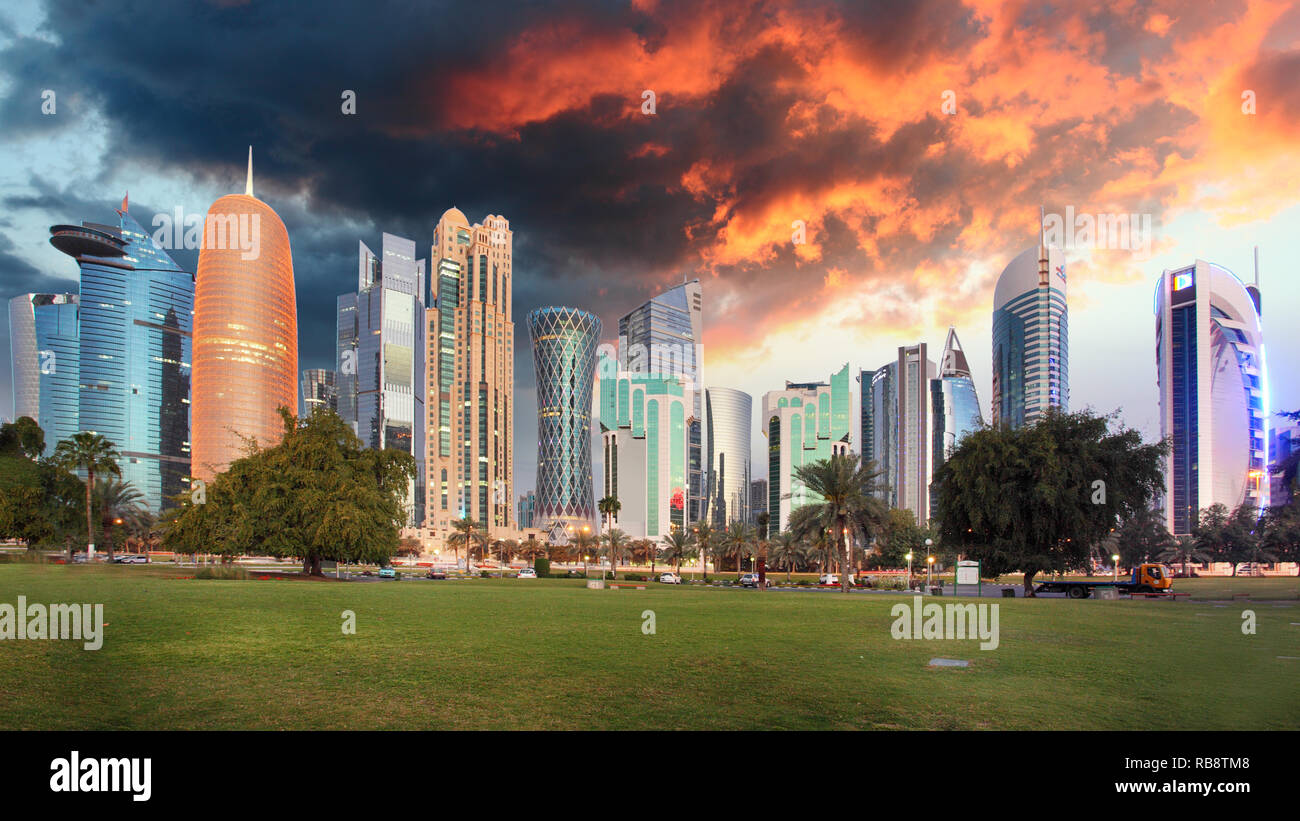 Doha skyline at dramatic sunrise, Qatar Stock Photo