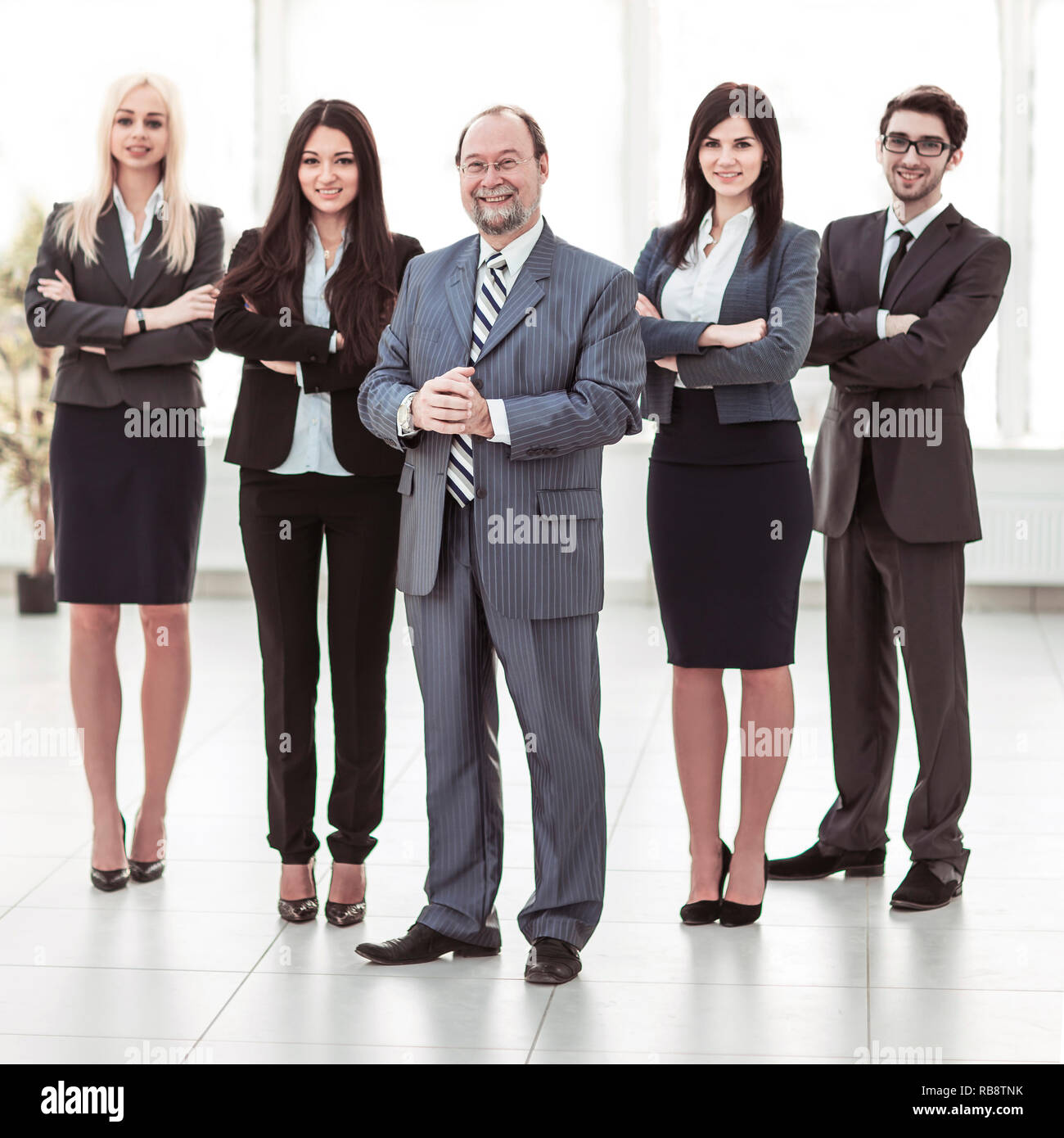 concept of success in business: professional business team on office  background Stock Photo - Alamy