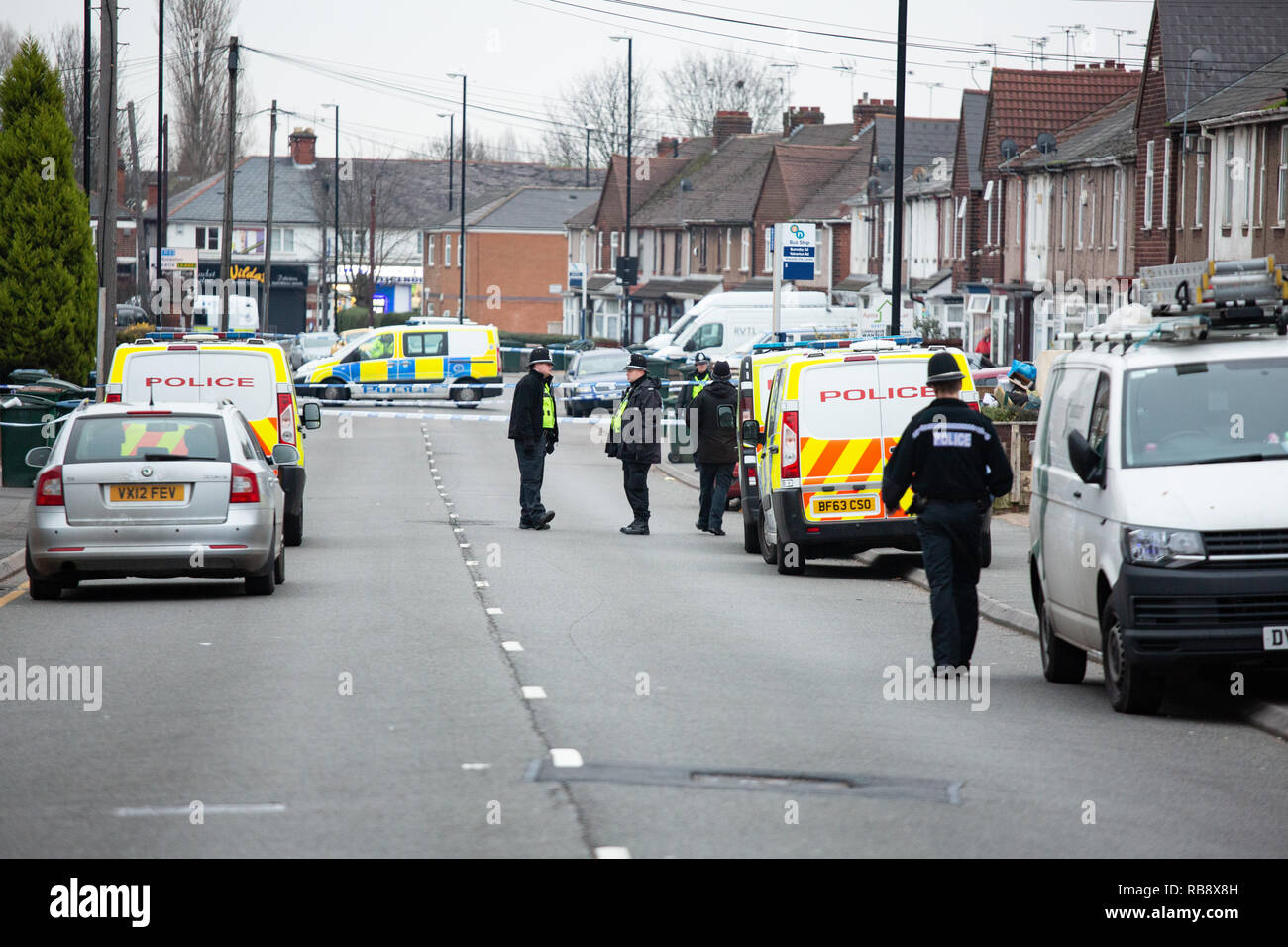 Police pictured in Burnaby Road, Coventry shortly after Police shot dead Sean Fitzgerald at a property in the street. Stock Photo