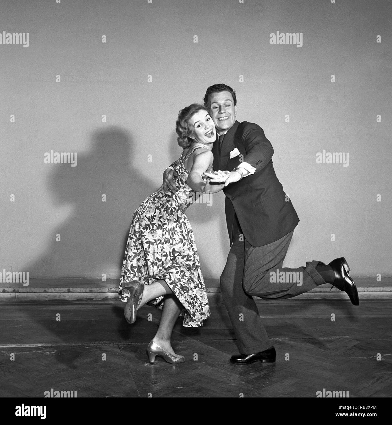 Charleston dance. A Dance named for the harbor city of Charleston, South Carolina and was popularized in the United States by a 1923 tune called The Charleston. The peak for the Charleston as a dance by the public was mid 1926 to 1927. Pictured Sonja Stjernquist and John Ivar Deckner dancing the Charleston 1950.  Photo Kristoffersson ref BA68-4 Stock Photo