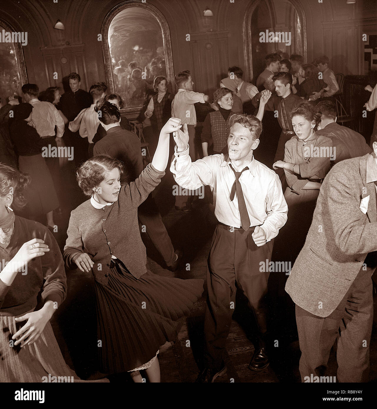 Dancing in the 1950s. The dance floor is filled with dancing couples moving to the music. Sweden 1953. Ref 2363 Stock Photo