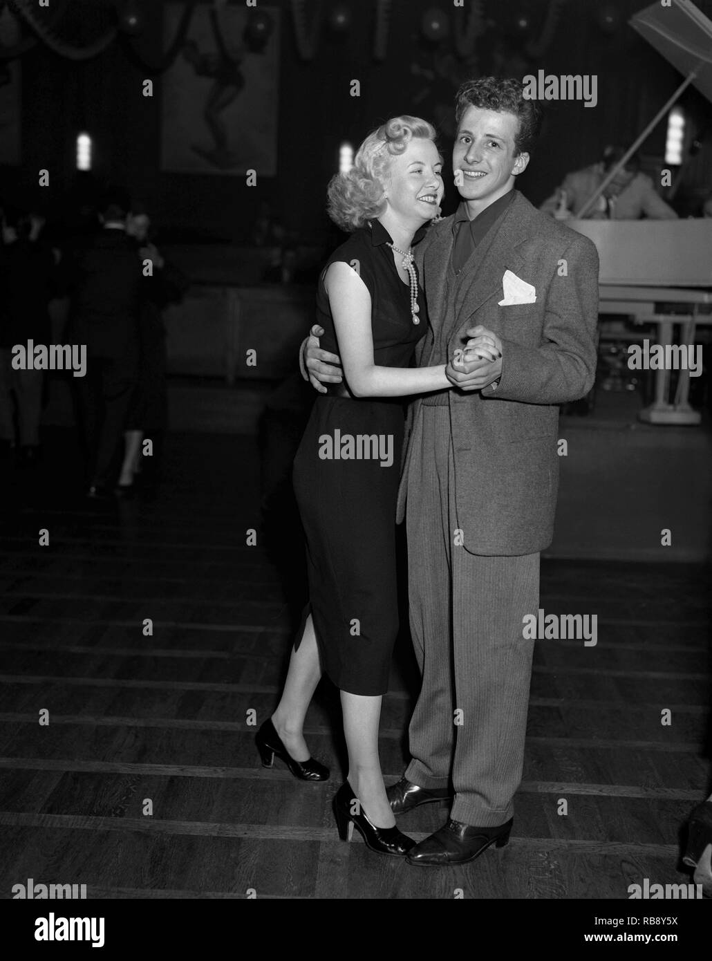 Dancing in the 1950s. A young couple is dancing and moving to the music. Sweden Ref 34K-33 Stock Photo