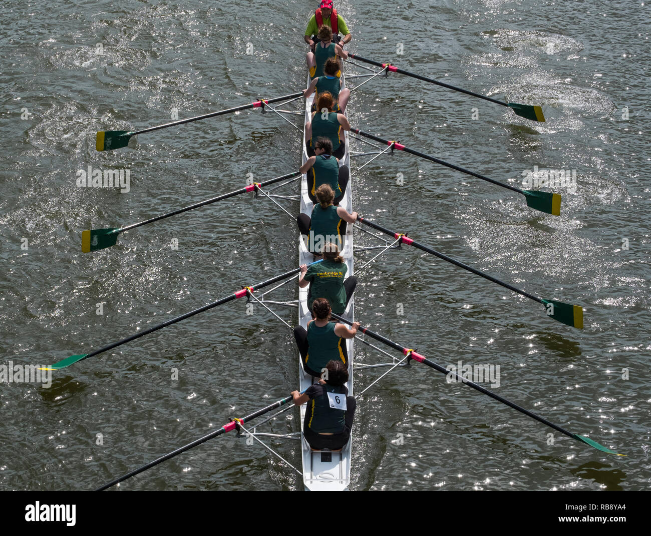 A rowing crew competing at Shrewsbury Regatta passing under Kingsland
