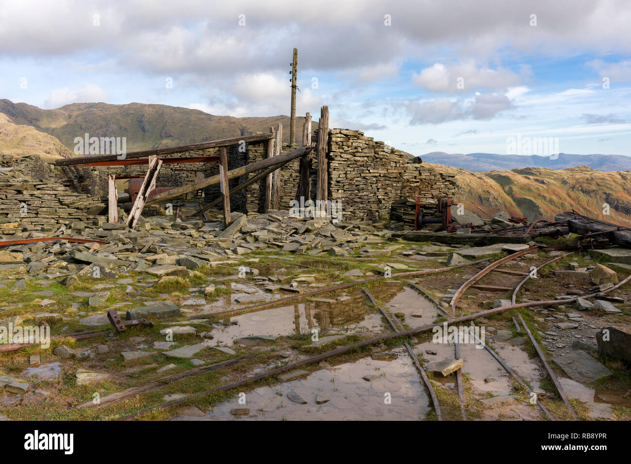 Derelict mine workings at Saddlestone Quarry on the flank of The Old Man of Coniston in the Lake District National Park, Cumbria, England. Stock Photo
