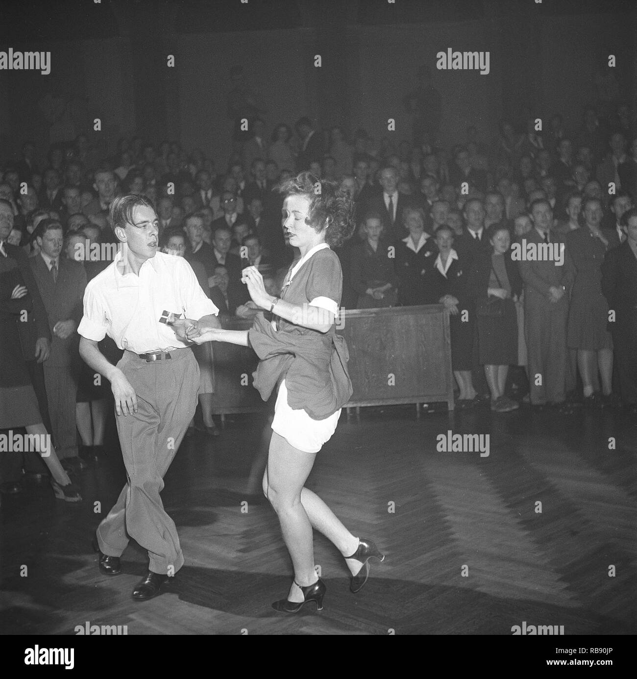Jitterbug dance. A dance popularized in the United states and spread by American soldiers and sailors around the world during the Second world war. Pictured here a young couple when dancing the Jitterbug dance 1948 during a competition dance event. Photo: Kristoffersson ref AM61-2 Stock Photo