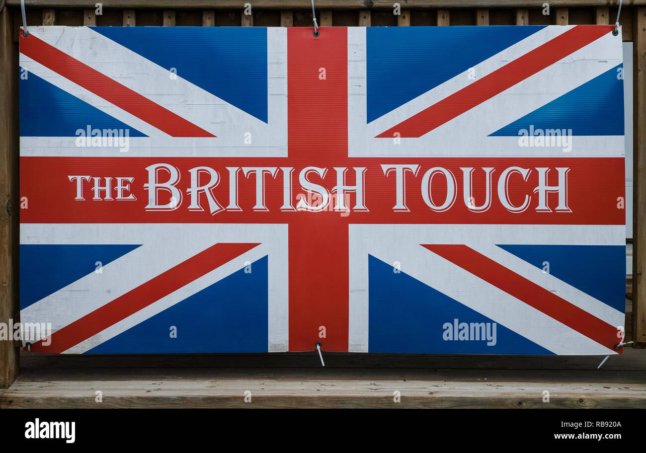 Signboard. Very British, classic little boutique with Brit chocolate ...