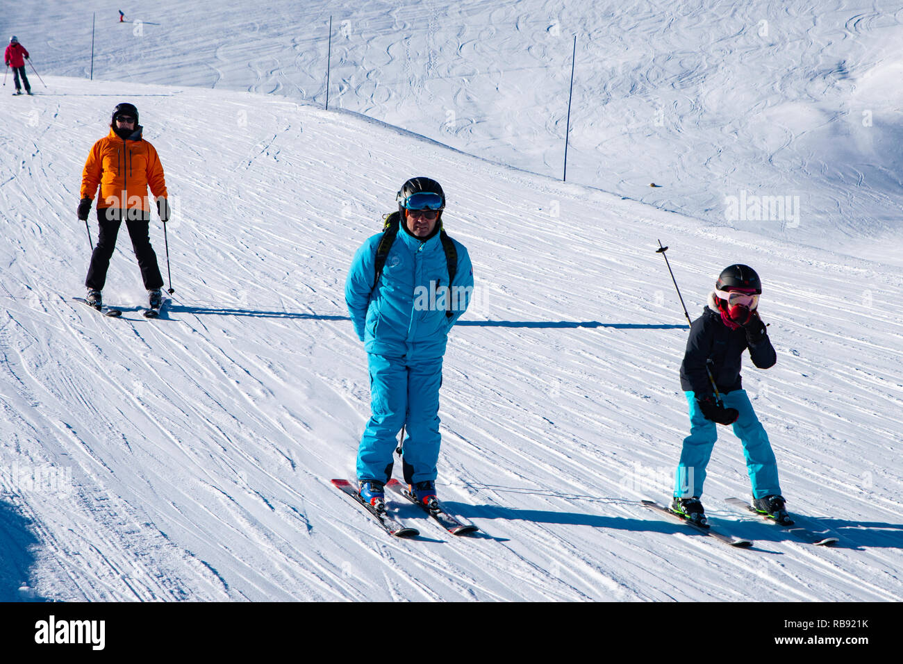 People  enjoy ski and snowboard for winter holiday in Alps area, Les Arcs 2000, Savoie, France, Europe Stock Photo