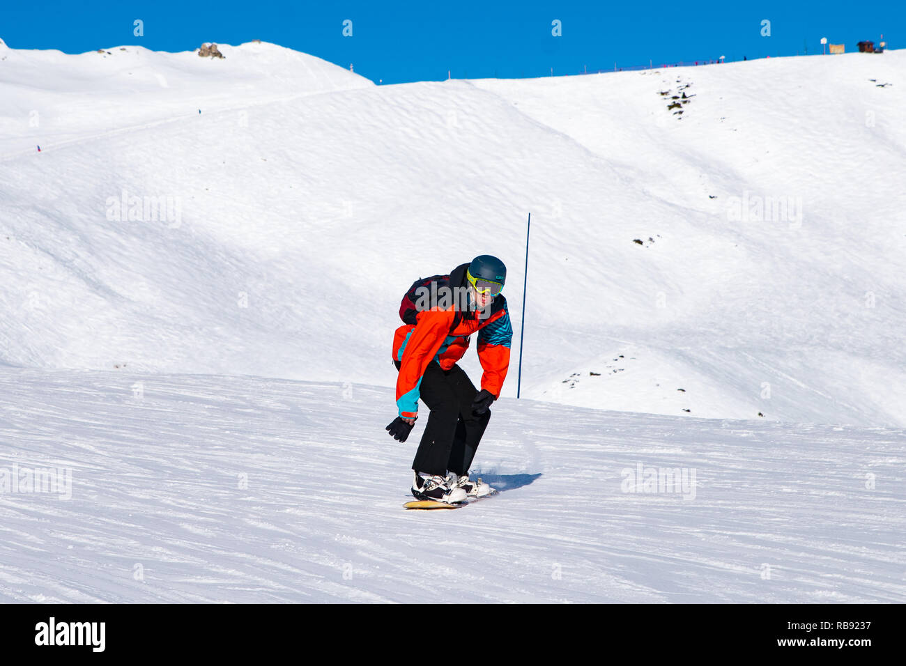People enjoy snowboard for winter holiday in Alps area, Les Arcs 2000, Savoie, France, Europe Stock Photo
