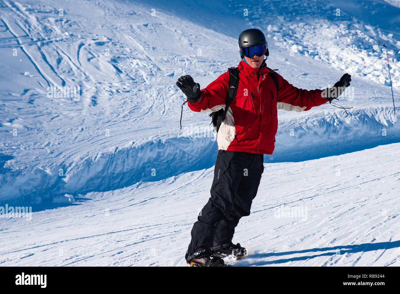 People enjoy snowboard for winter holiday in Alps area, Les Arcs 2000