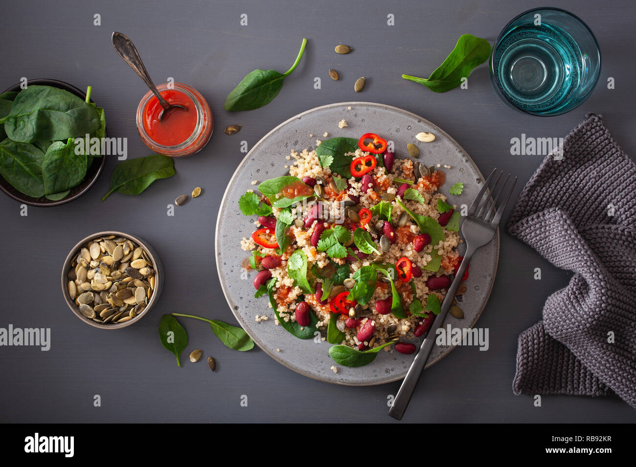 healthy bean and quinoa salad with spinach, chili Stock Photo