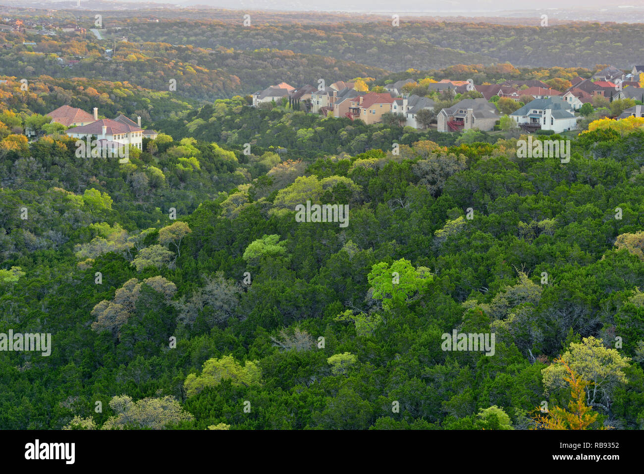Overlooking Hill Country bedroom communities at sunrise, Austin, Texas, USA Stock Photo