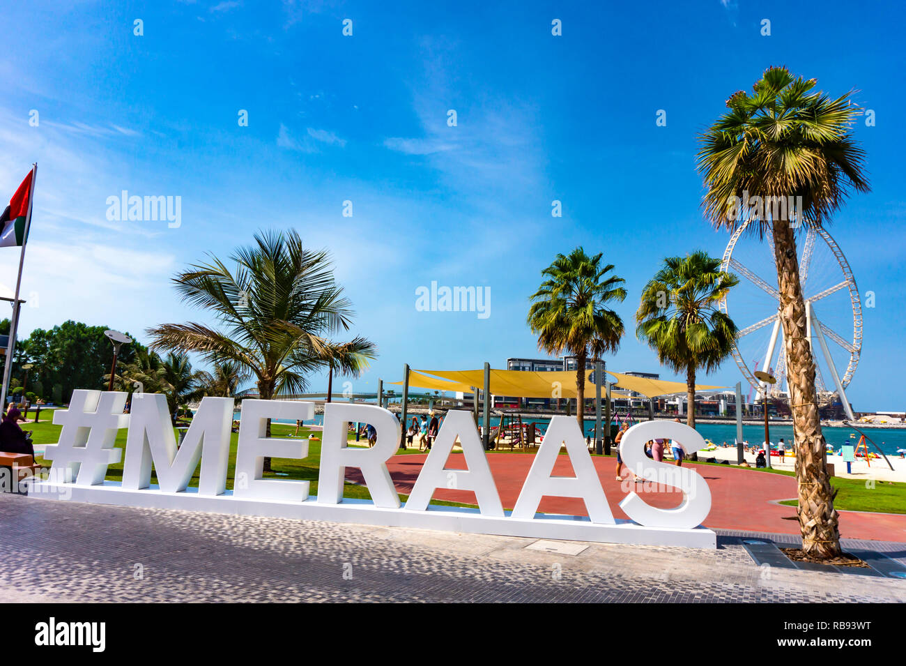 Dubai UAE - 06.11.2018 :Hashtag Meraas on The Walk Jumeirah Beach Residence The Walk is a 1.7 kilometer strip at ground level of the Jumeirah Beach Re Stock Photo