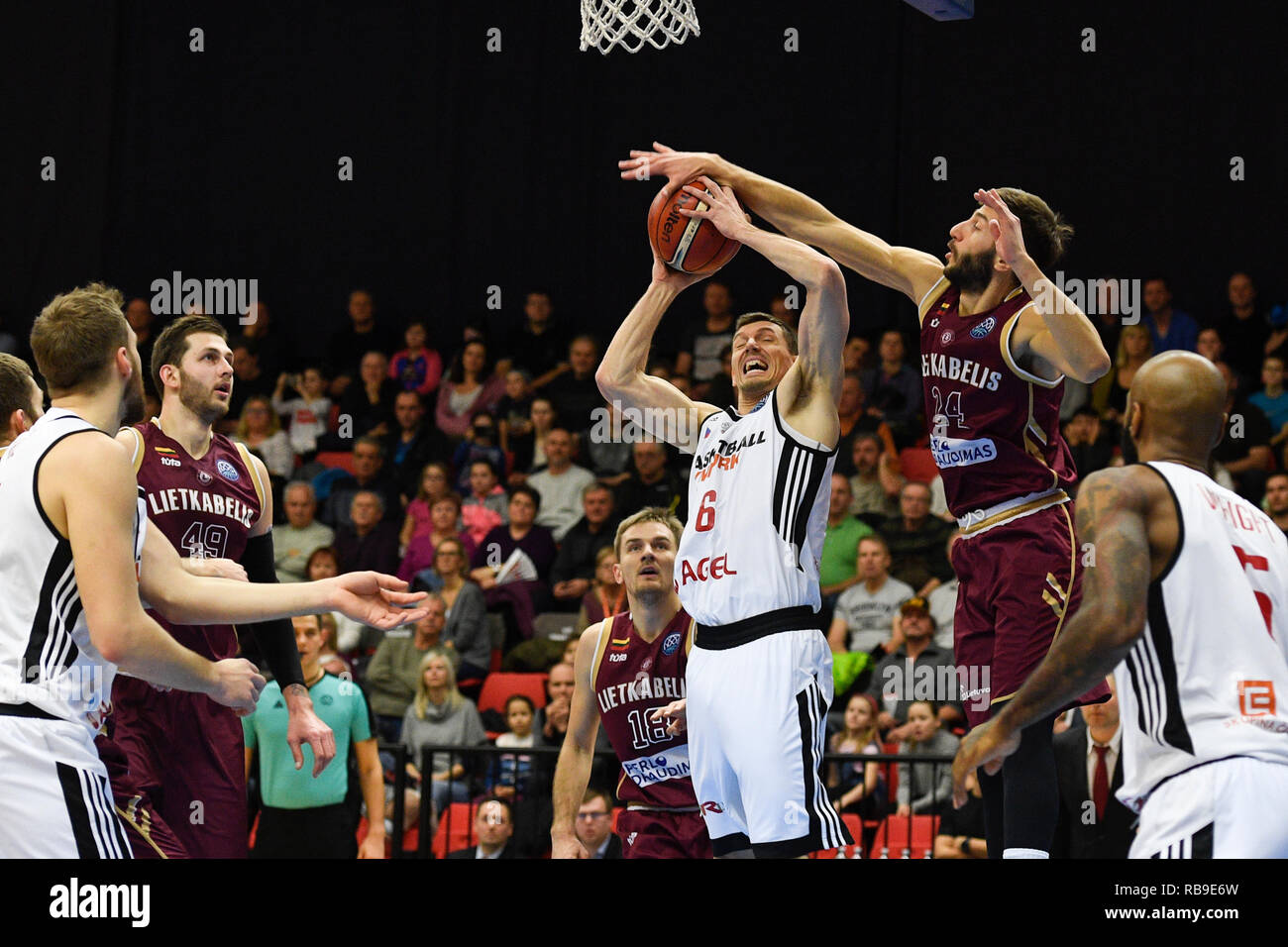 Nymburk, Czech Republic. 08th Jan, 2019. From left PAVEL PUMPRLA of Nymburk and MARKO CAKAREVIC of Panevezys in action during Men's basketball Champions League, 10th round, Group C match Lietkabelis Panevezys of Lithuania vs. Czech CEZ Basketball Nymburk in Nymburk, Czech Republic, January 8, 2019. Credit: Michal Kamaryt/CTK Photo/Alamy Live News Stock Photo