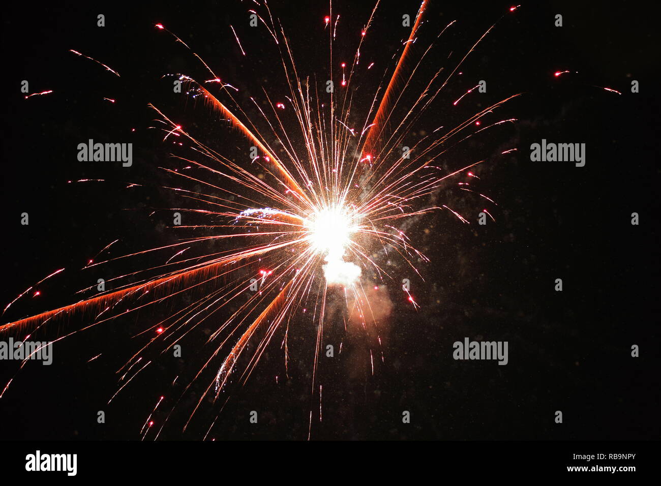 New Year's launched fireworks exploded in the sky Stock Photo - Alamy