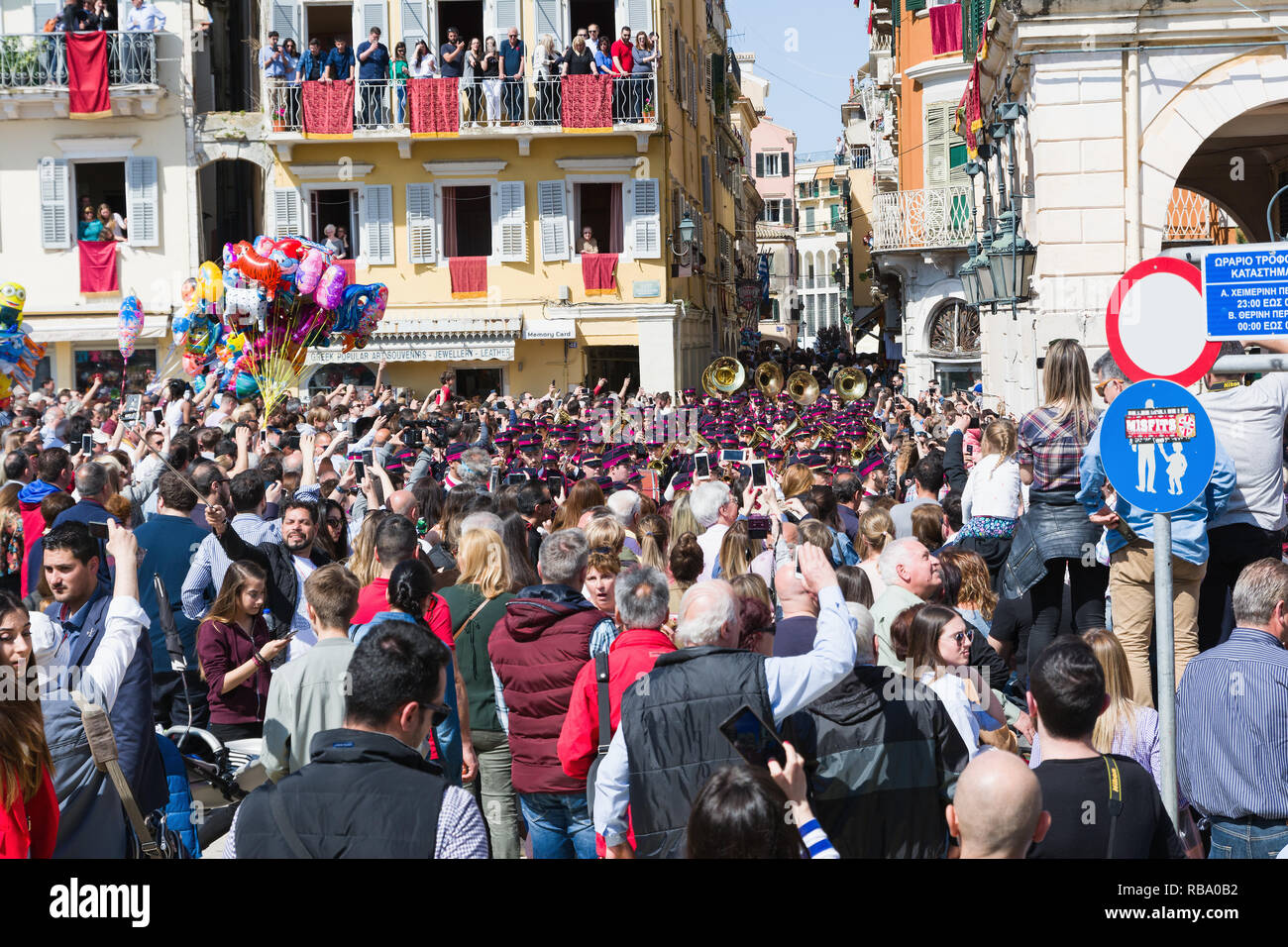 CORFU, GREECE APRIL 7, 2018 Corfians throw clay pots from windows