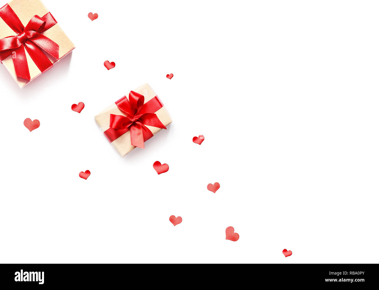 Gift box with red ribbon and heart on white background Stock Photo - Alamy