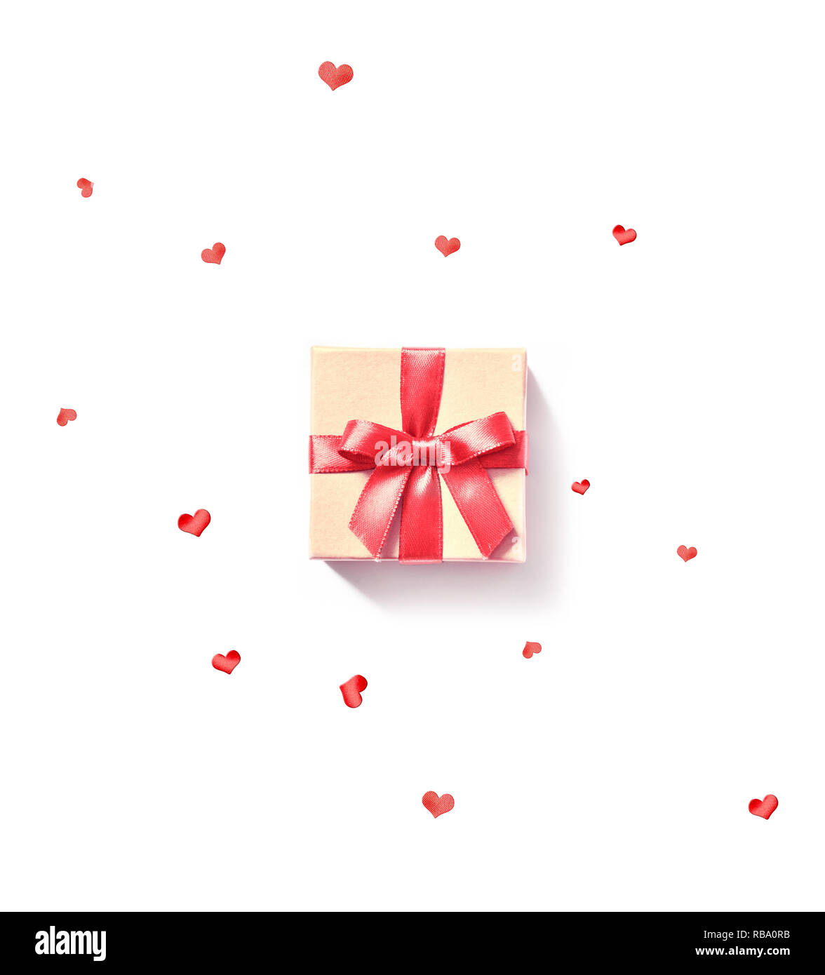 Gift box with red ribbon and heart on white background Stock Photo - Alamy