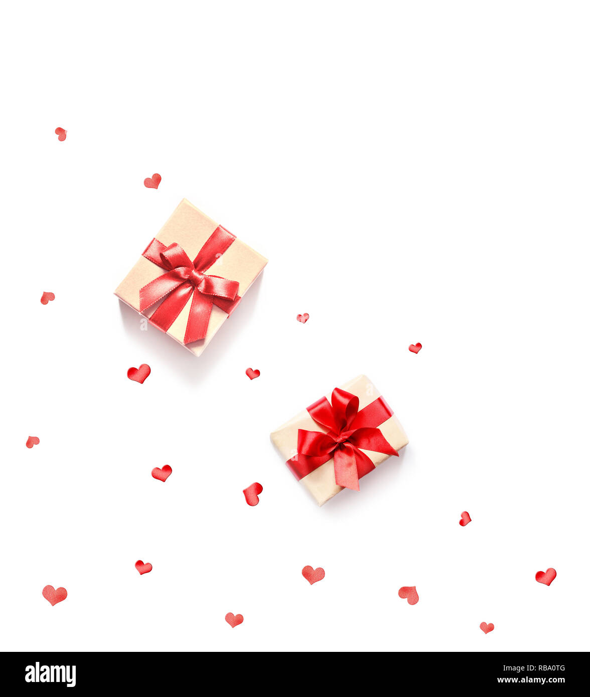 Gift box with red ribbon and heart on white background Stock Photo - Alamy