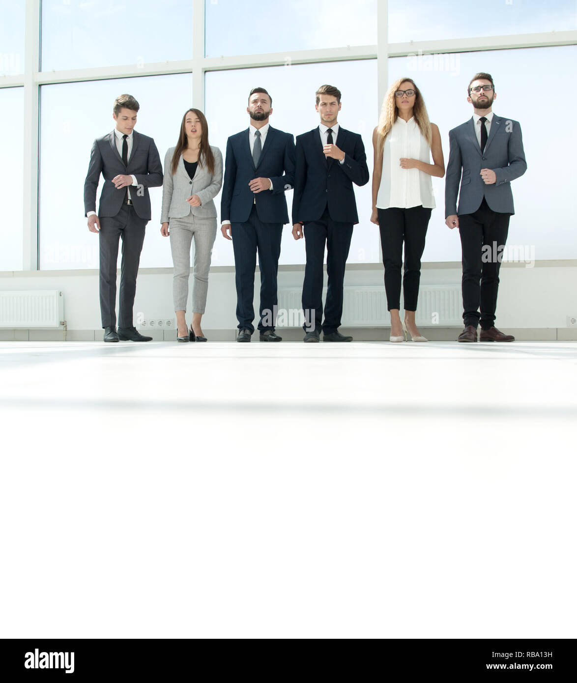 Business people standing shadows hi-res stock photography and images ...