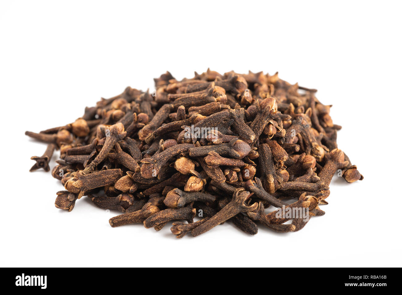 Cloves heap isolated on white background Stock Photo