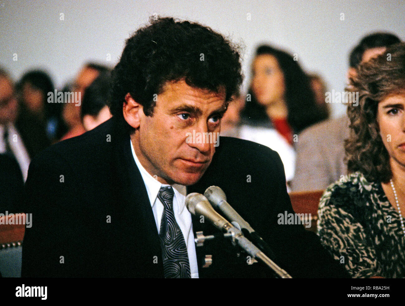 Actor and director Paul Michael Glaser, husband of Elizabeth Glaser,  testifies during a pediatric AIDS hearing before the United States House Budget Committee's Task Force on Human Resources on Capitol Hill in Washington, DC, March 13, 1990. Elizabeth Glaser contracted the AIDS virus after receiving an HIV-contaminated blood transfusion in 1981 while giving birth, subsequently infecting both of her children. One of his children, daughter Ariel, died in 1988 of the disease.  Mrs. Glaser passed away from the disease on December 3, 1994.    Credit: Howard Sachs / CNP /MediaPunch Stock Photo