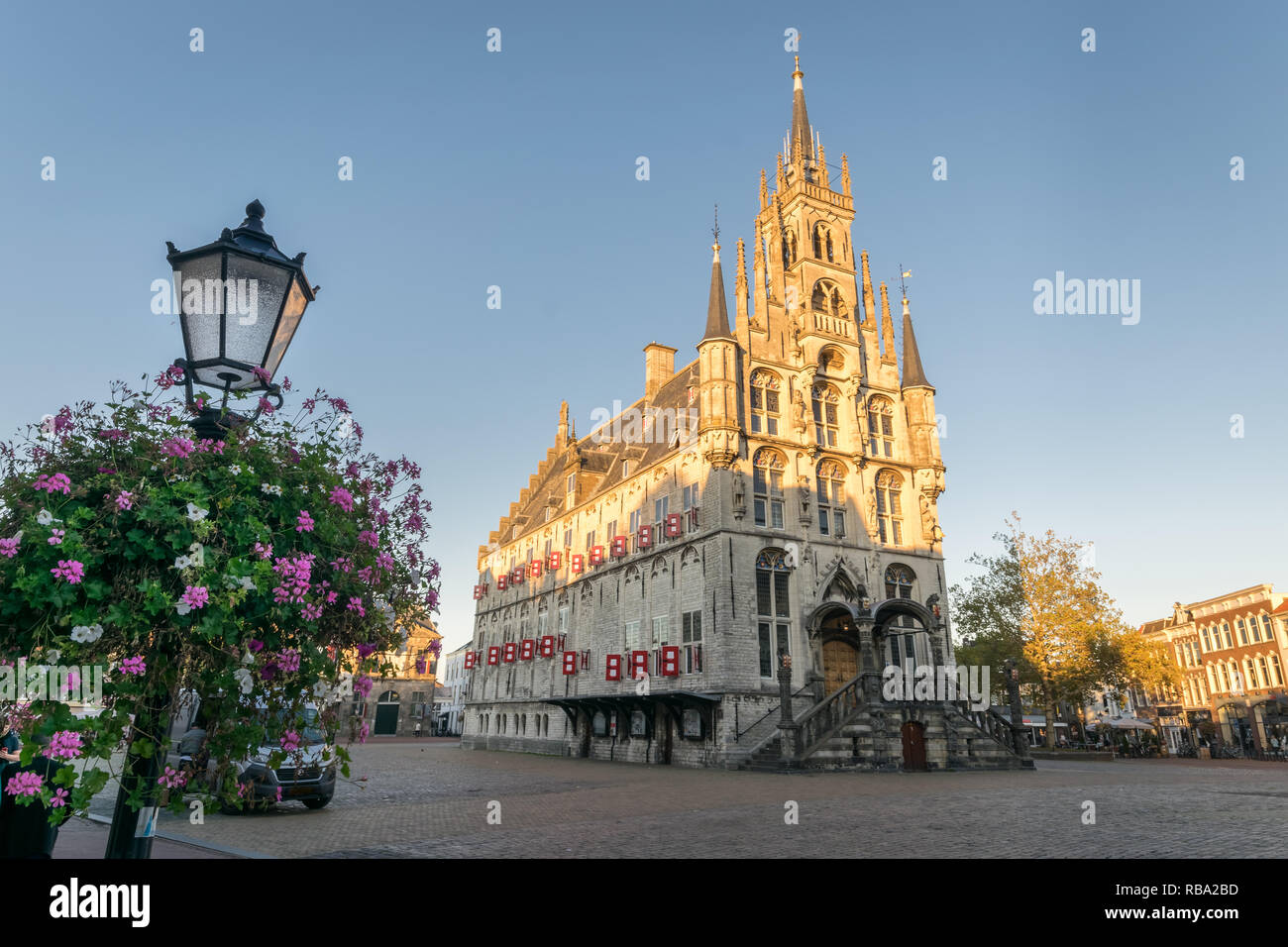 Gothic city hall of Gouda, The Netherlands at sunset. Old City Hall at the Market square - built between 1448 and 1450. Stock Photo