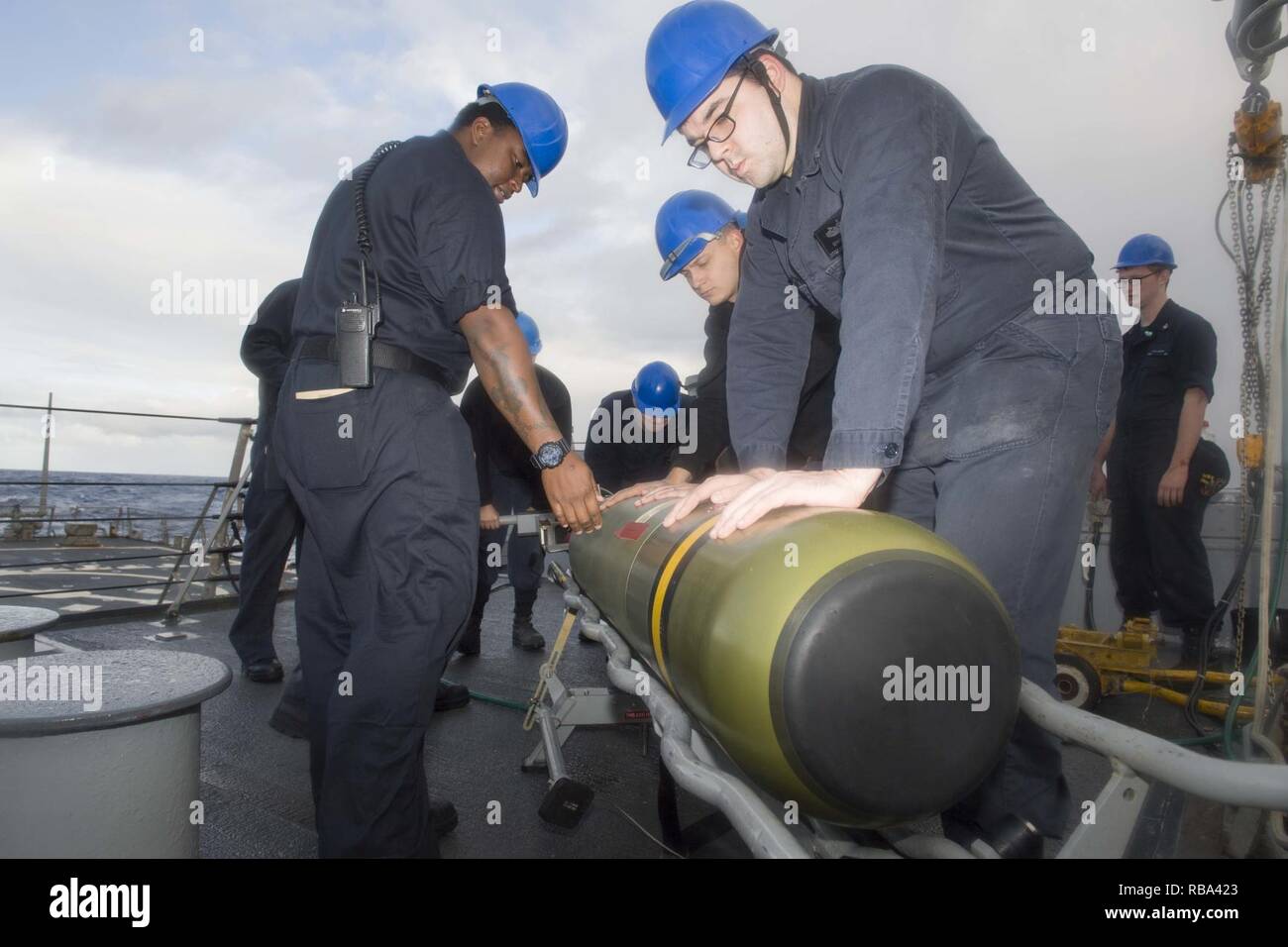 ATLANTIC OCEAN (Dec. 20, 2016) Sailors load a Mark 46 Mod 5A(S) into ...