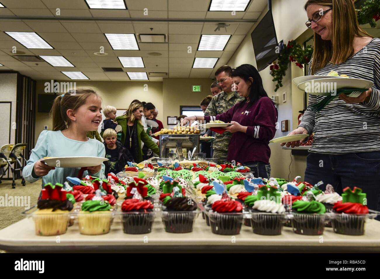 Attendees of the Team Buckley Spouse and Family Day fill their plates