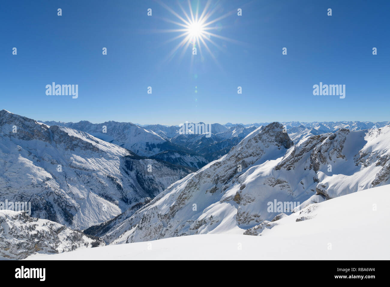 Karwendel mountainrange with sun in winter, Mittenwald, Upper Bavaria, Bavaria, Germany, European Alps Stock Photo