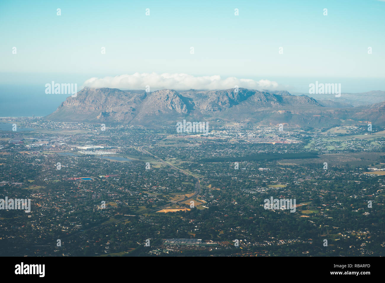 Low lying cloud hanging over a mountain near to Cape Town, South Africa. Stock Photo