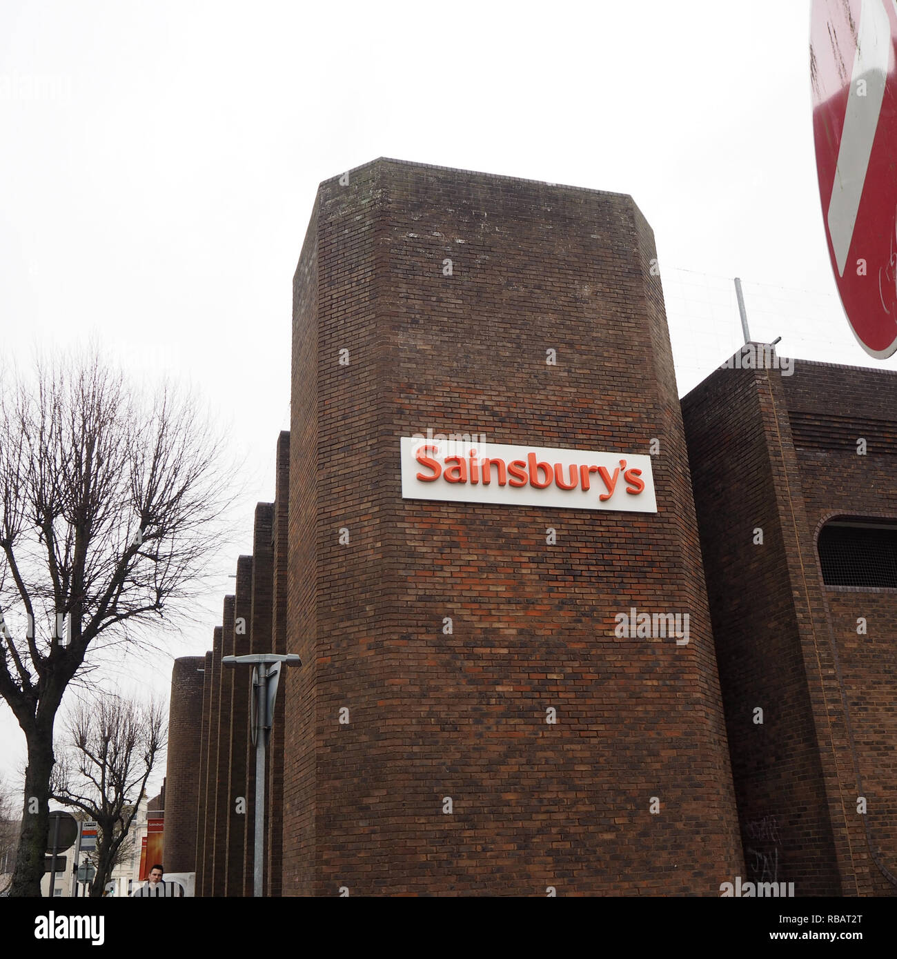 Sainsburys logo trademark on the side of a building Stock Photo