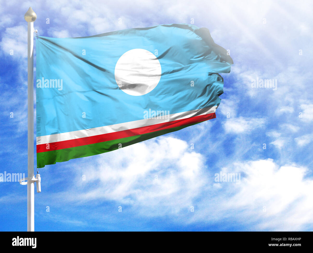 National Flag Of Sakha Republic On A Flagpole In Front Of Blue Sky Stock Photo Alamy