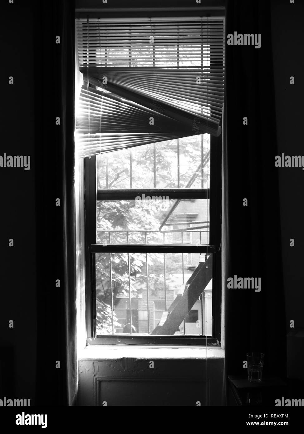 Inside Out Window with Worn Blinds in New York Apartment Stock Photo
