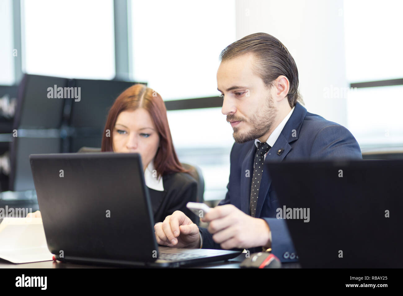 Business people in modern office. Stock Photo