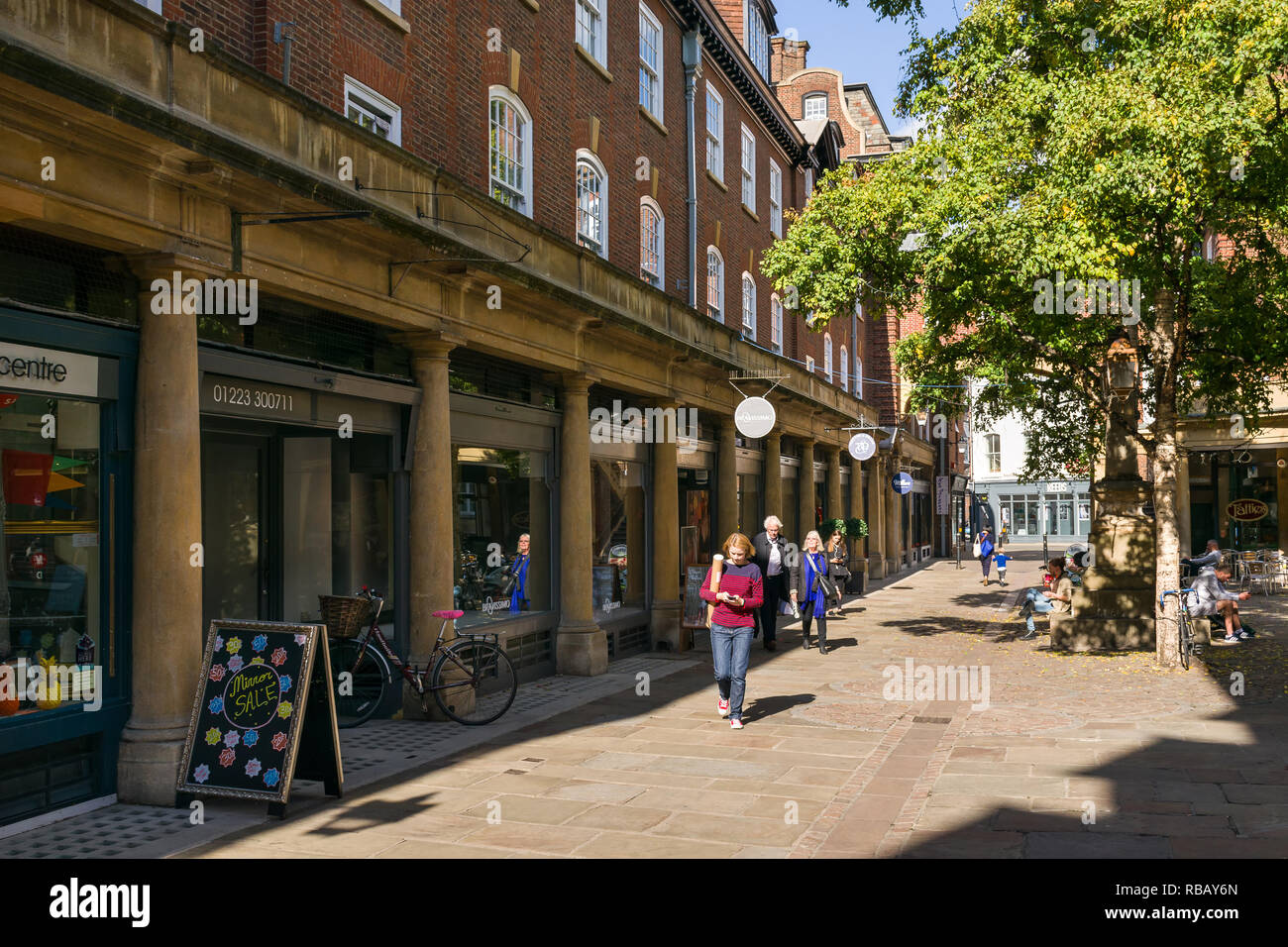 People walking past shops on the pedestrianised Sussex Street on a sunny Summer afternoon, Cambridge, UK Stock Photo