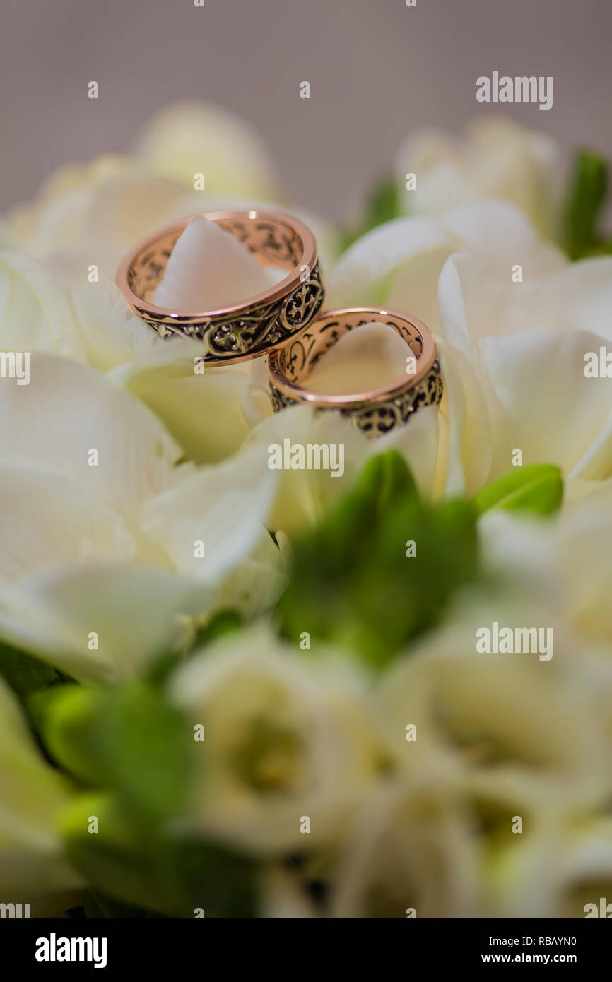 Two wedding rings in infinity sign. Love concept Stock Photo - Alamy