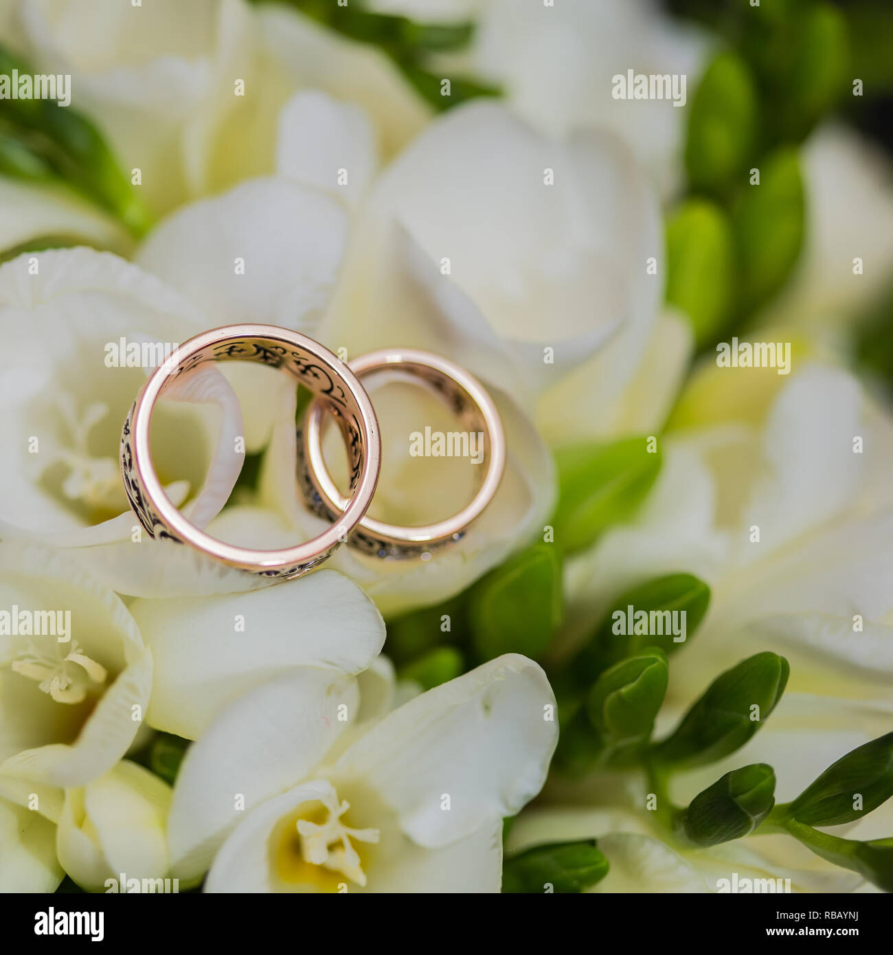 Two wedding rings in infinity sign. Love concept Stock Photo - Alamy