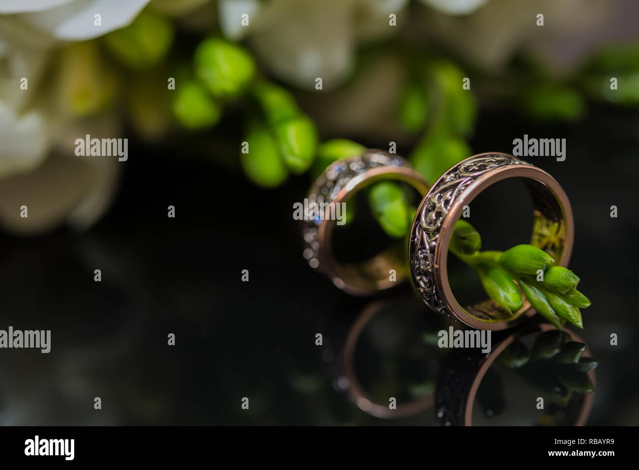 Two wedding rings in infinity sign. Love concept Stock Photo - Alamy