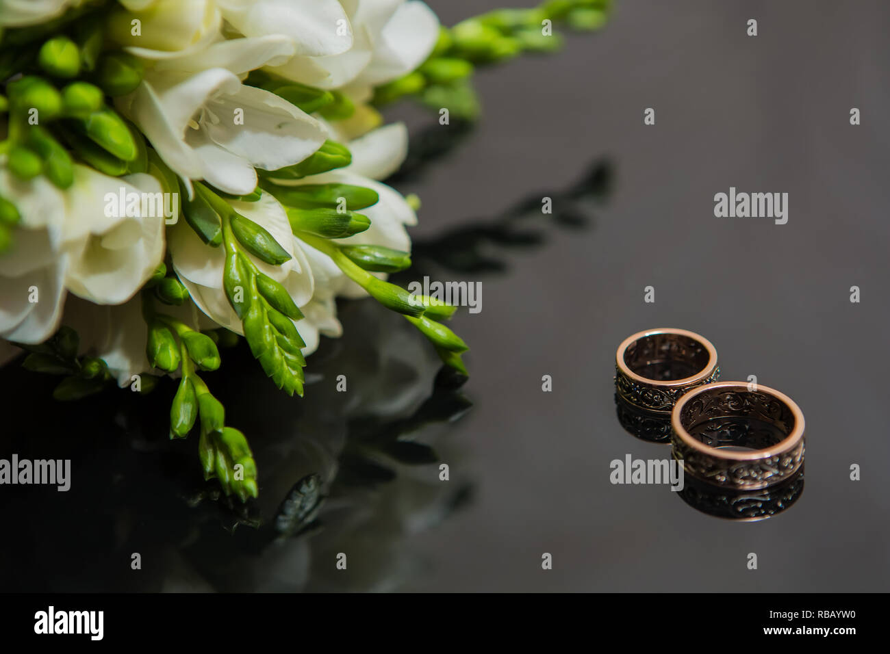 Two wedding rings in infinity sign. Love concept Stock Photo - Alamy
