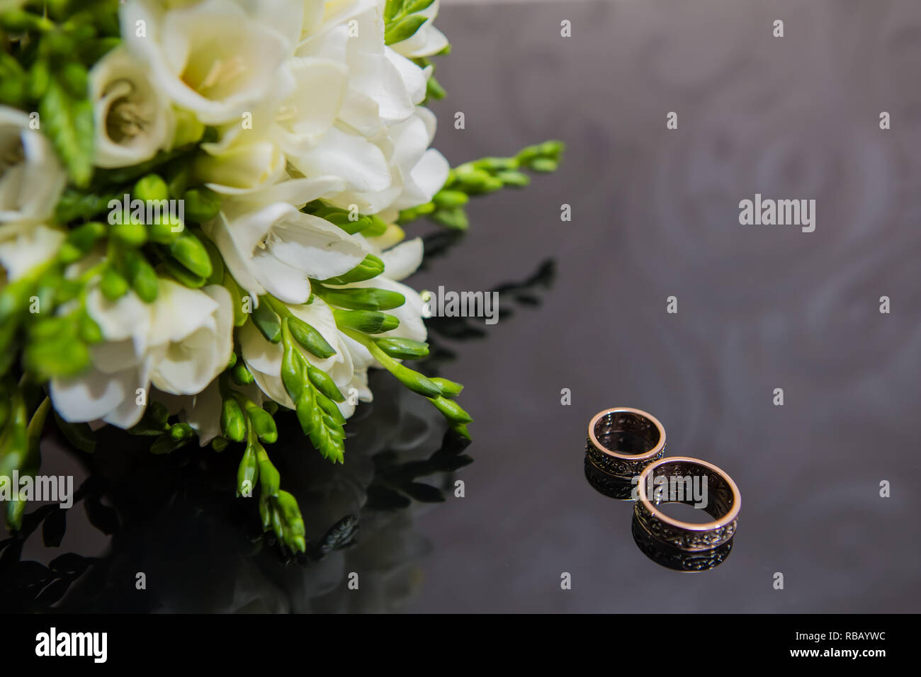 Two wedding rings in infinity sign. Love concept Stock Photo - Alamy