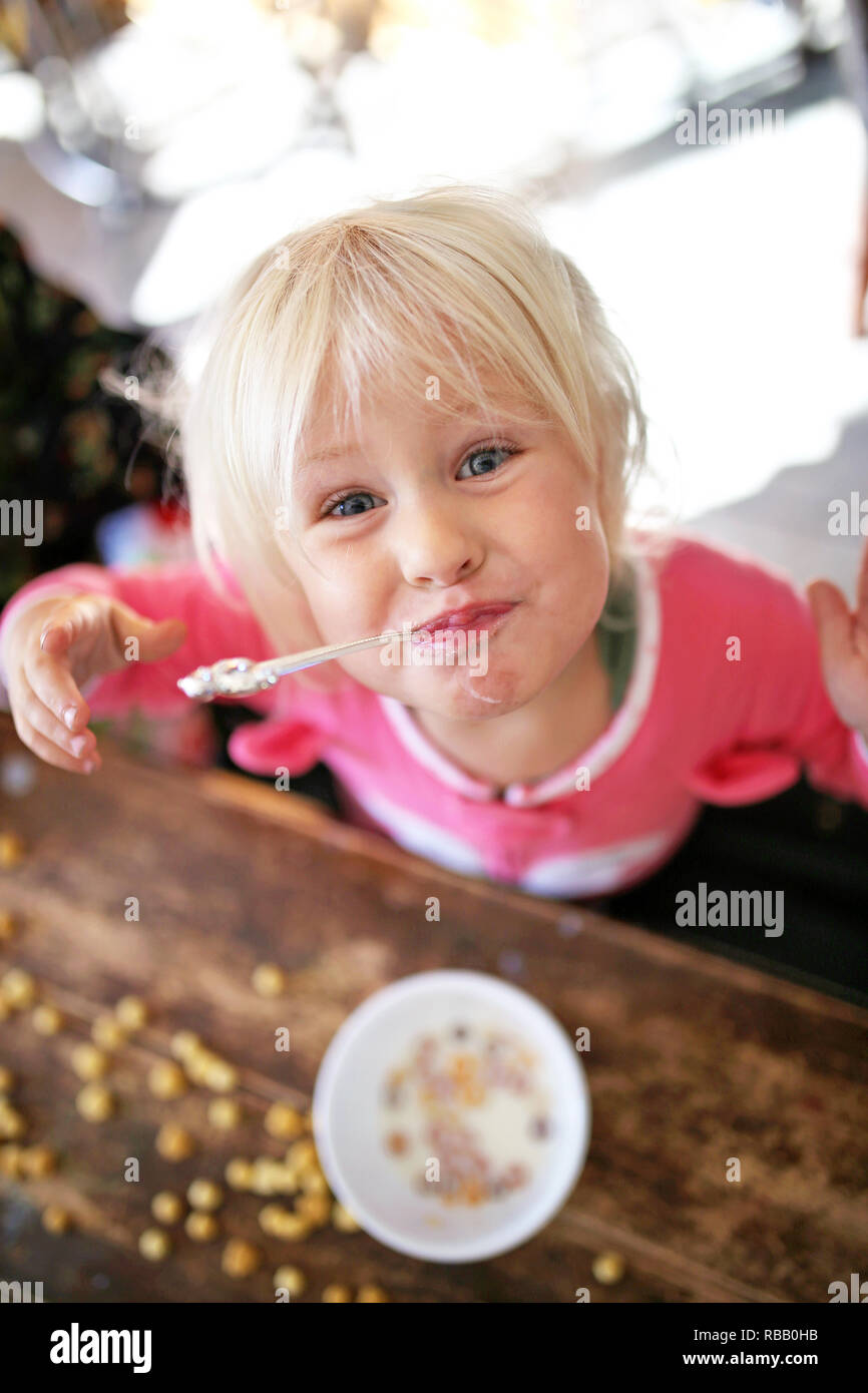 Baby eating cereal hires stock photography and images Alamy
